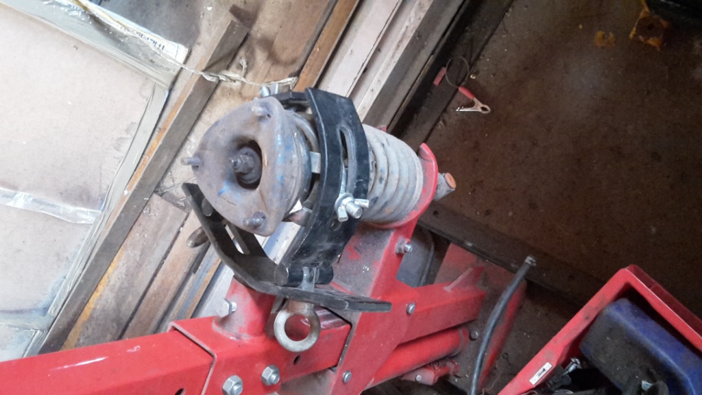 Removing first spring. Didn't see the point in taking pics of every one.