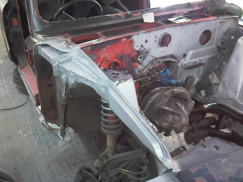 welding done on drivers side, (I cut and rebuilt the the post) i fibreglass across all weld lines to make 100% sure no water can get to it, after it will be sealed aswell