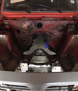 Engine bay stripped as much as possible, including the insulation. Will be added to the inside when done