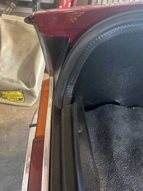 And this is the transition from the side to rear.  Its not ideal because it does leave a leak path but the positioning should allow water to naturally drain