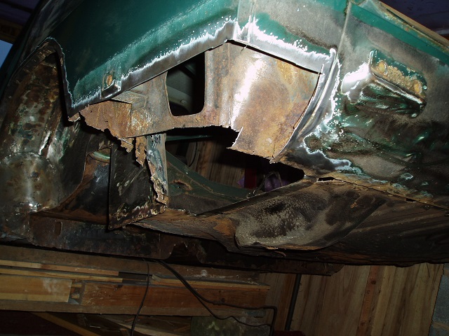 Panels cut away and cleaned of rust.