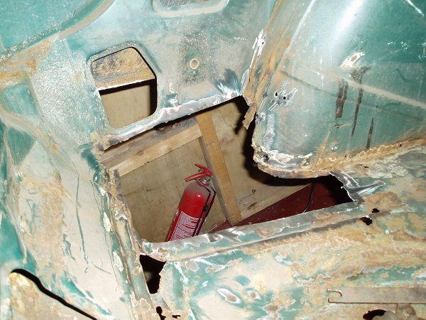 The near-side rear boot area after rust cut away. Off-side similar.