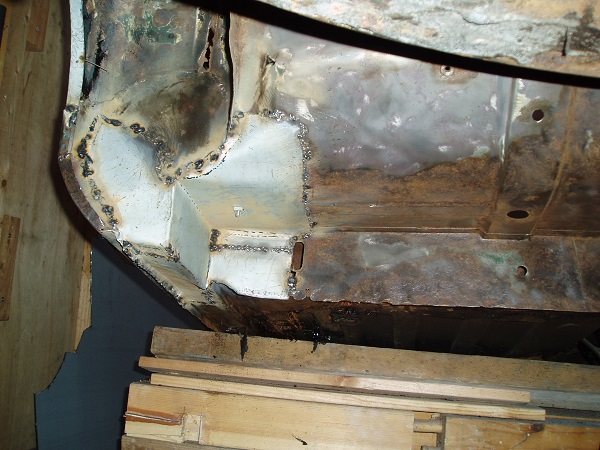 The near-side sill and box section strengthened. Same on other side.