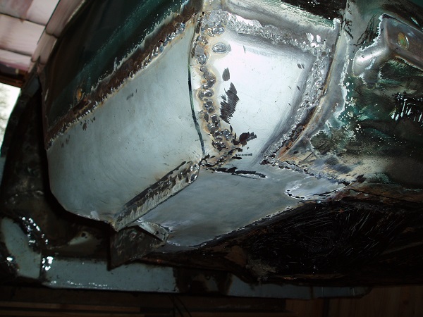The near-side lower wing repair and strengthening which will require filling later.
