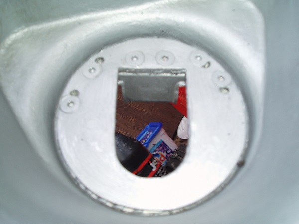 The plates on the inside of the trailing arm holding the 'L' brackets in place.