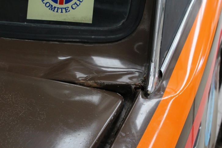 Creased panels at base of C pillar.  Boot won't close.