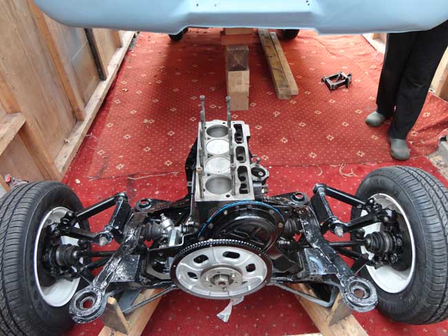 Assembled sub-fame and engine with Wife's legs in background.