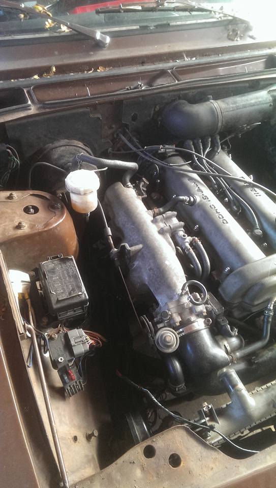 drivers side of engine.
